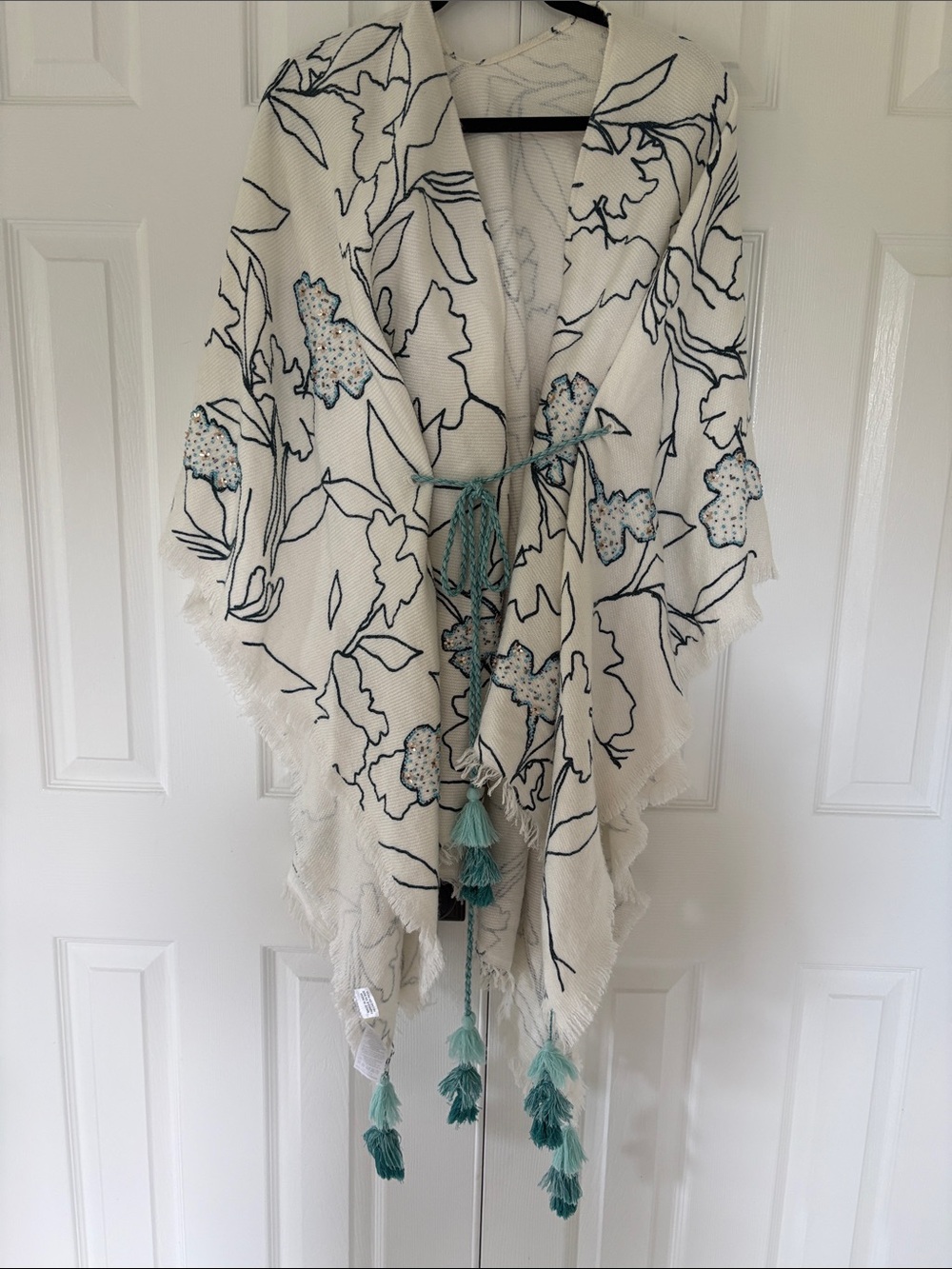 Anthropologie Ivory Floral Fringe poncho with Teal Tassels